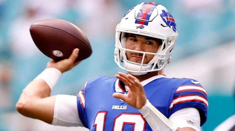 Bills quarterback Mitchell Trubisky warms up before the game against the...