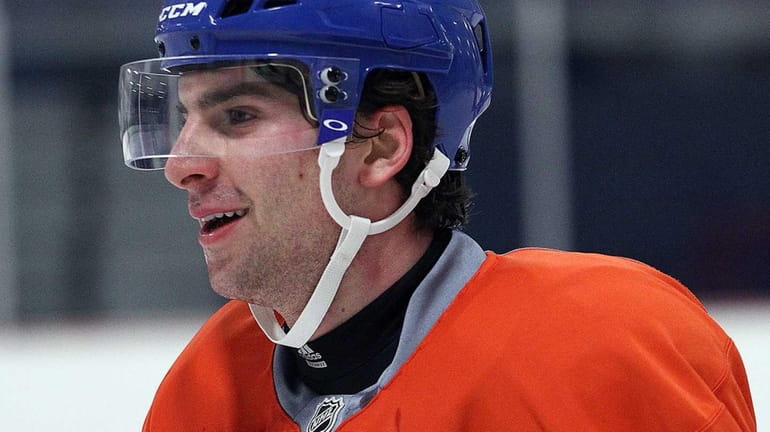 John Tavares skates for the first time during practice in...