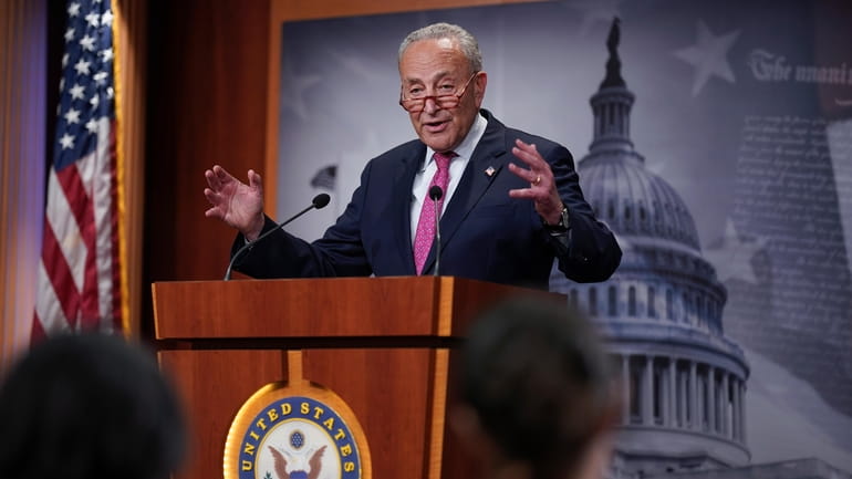 Senate Majority Leader Chuck Schumer speaks to reporters after a hectic...