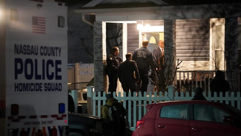 Nassau police at the Maryland Avenue home in Hempstead last...