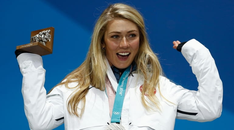 Mikaela Shiffrin celebrates during the medals ceremony at the Winter...