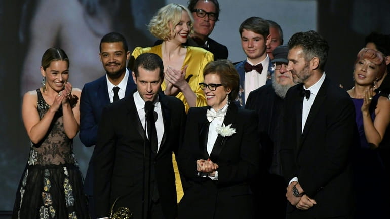 Writer-producer D.B. Weiss, center left, and the cast of "Game...