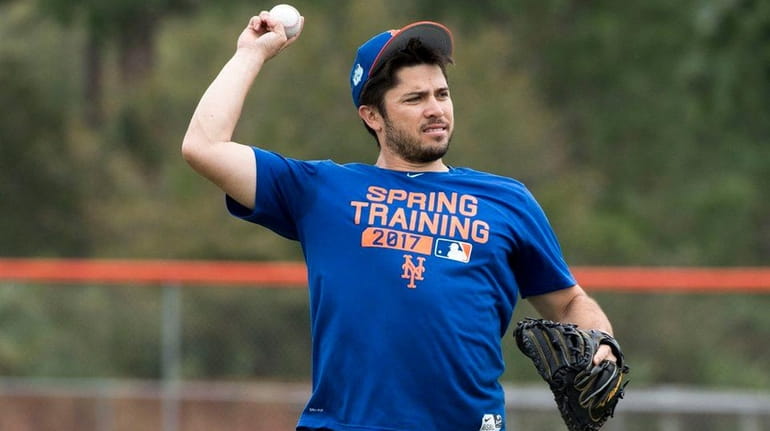 Mets catcher Travis d'Arnaud, here during a workout Monday, Feb....