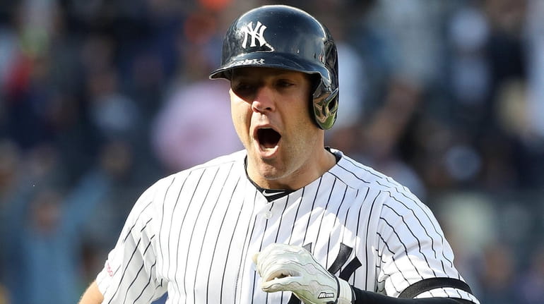 Austin Romine reacts after hitting a walk-off single in the...