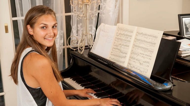 Pierson/Bridgehampton field hockey star Erica Selyukova plays the piano.