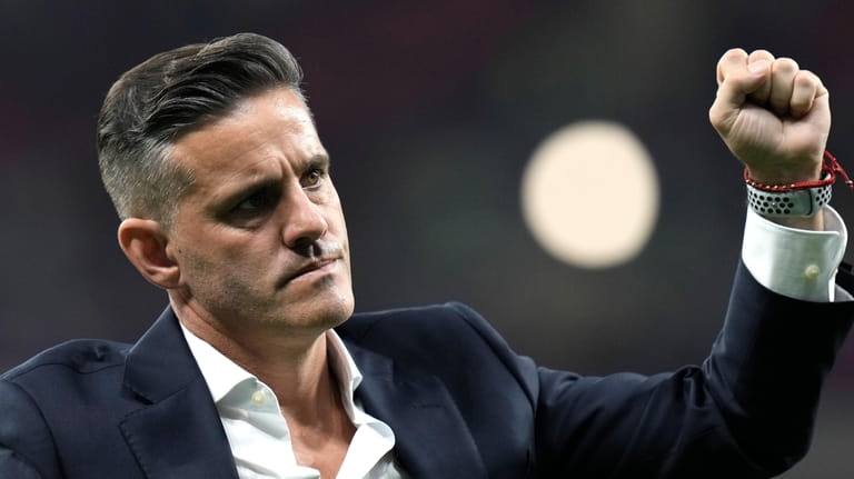 Canada's head coach John Herdman reacts at the end of...