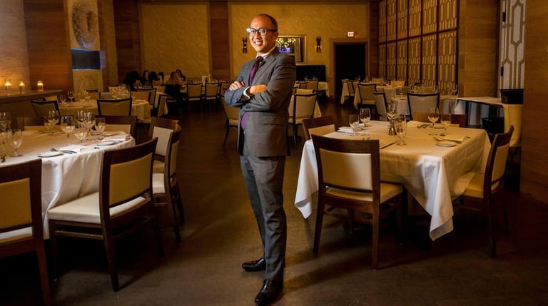 Charles Kim, general manager at Opus Steakhouse in Jericho.