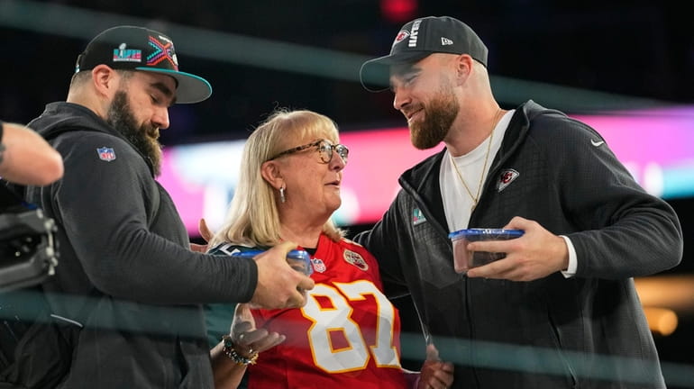 Donna Kelce greets her sons, Philadelphia Eagles center Jason Kelce,...