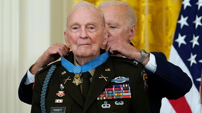 President Joe Biden presents the Medal of Honor to retired...