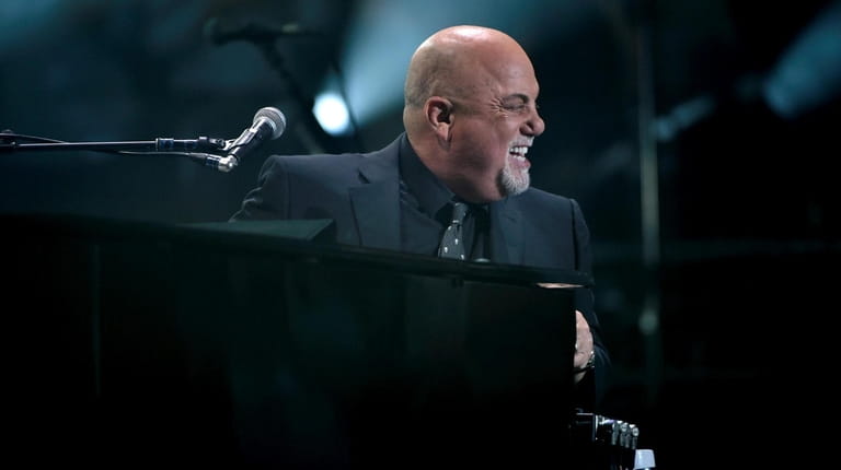 Billy Joel performs during his 100th lifetime performance at Madison...