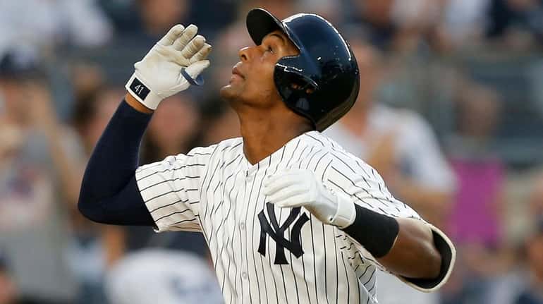 Miguel Andujar of the Yankees celebrates his second inning home run...