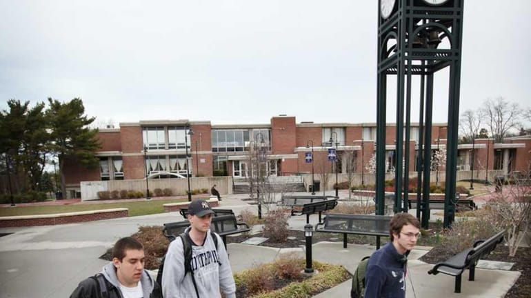 Students make their way across the campus of Suffolk County...
