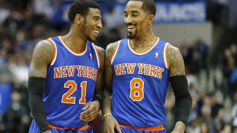 Iman Shumpert (21) and J.R. Smith (8) smile as they...