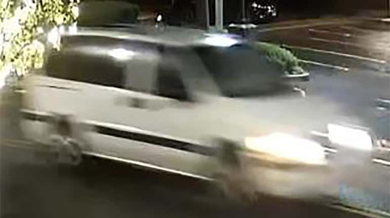 This surveillance image shows the minivan sought in an incident...