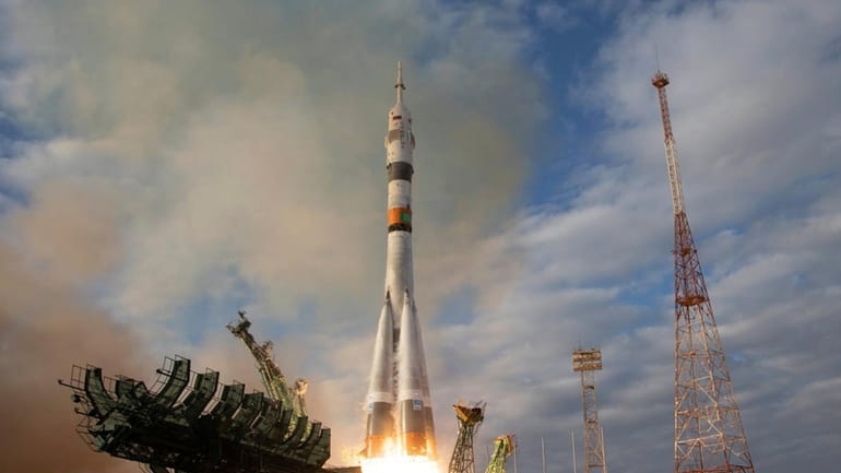 In this photo released by Roscosmos space corporation, the Soyuz...