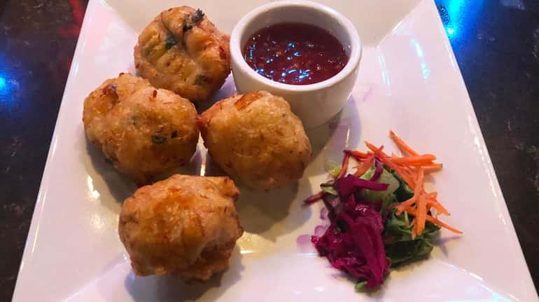 Codfish fritters at Hush Restaurant & Lounge, a new hot...