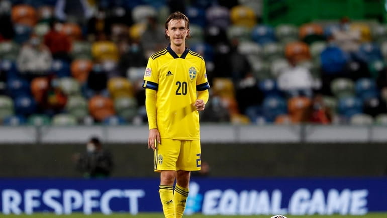 Sweden's Kristoffer Olsson waits to take a free kick during...