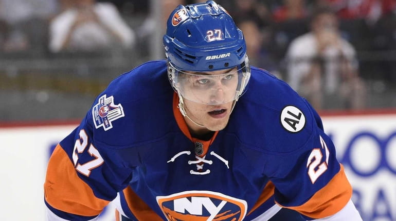 New York Islanders center Anders Lee looks on against the...
