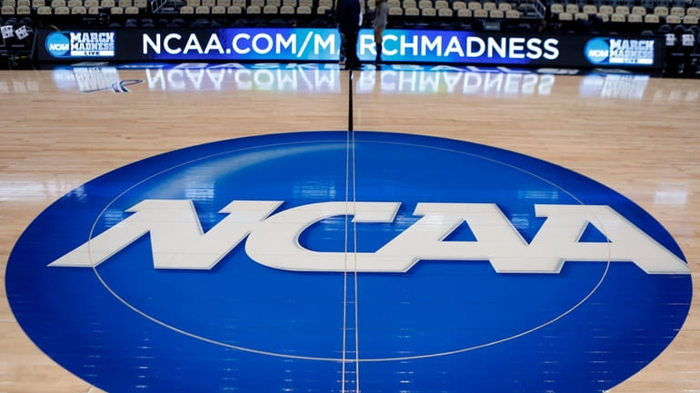 In this March 18, 2015, file photo, the NCAA logo...