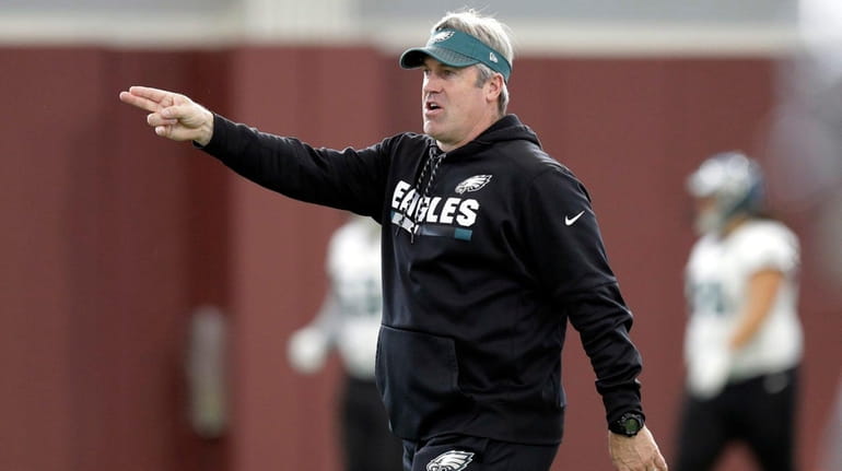 Eagles head coach Doug Pederson gives directions during a practice...