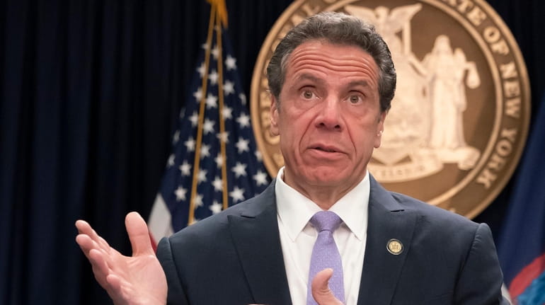 Gov. Andrew Cuomo responds to reporters questions at his Manhattan office...
