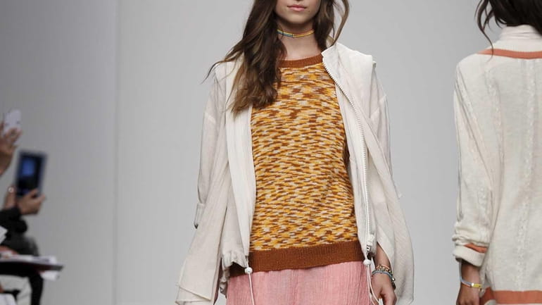 Karen Walker's spring-ready pants ($350), print sweater ($205) and cropped...