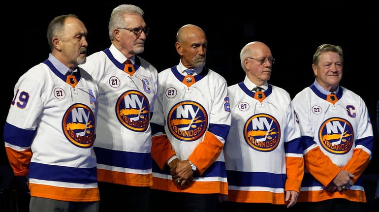 Former New York Islanders, from left, Bryan Trottier, Clark Gillies,...