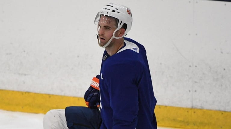 Islanders left wing Andrew Ladd looks on during special teams...