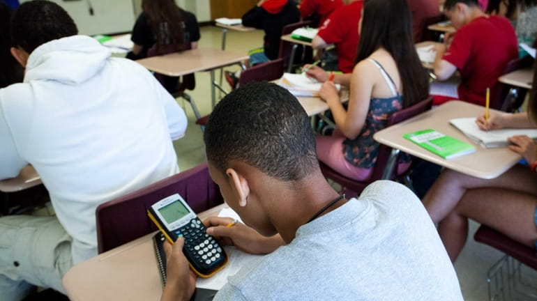 A student uses a TI-84 Plus calculator to help solve...