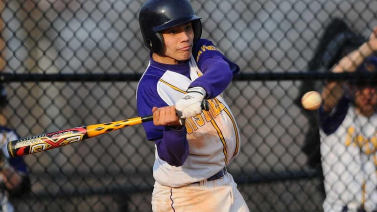 Oyster Bay's Robert Morgan clears the bases with a three-run,...