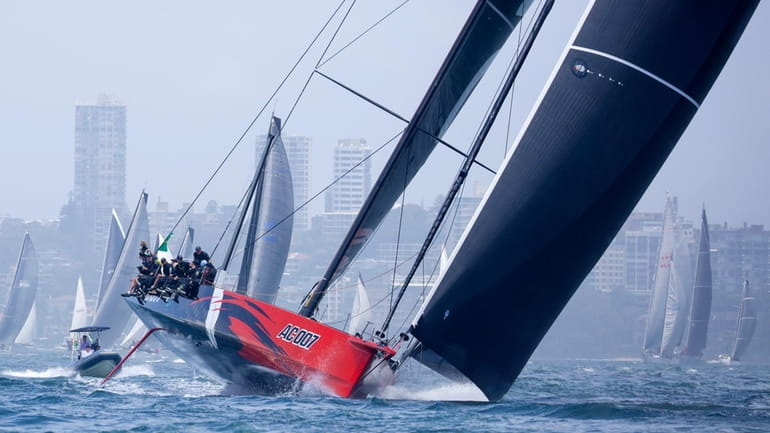 Comanche heads down Sydney Harbour during the start of the...