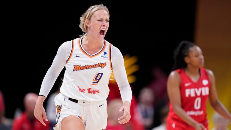 Phoenix Mercury's Sophie Cunningham reacts after hitting a 3-point basket...