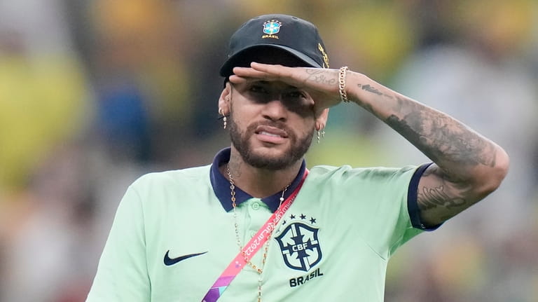 Brazil's Neymar gestures after the World Cup group G soccer...