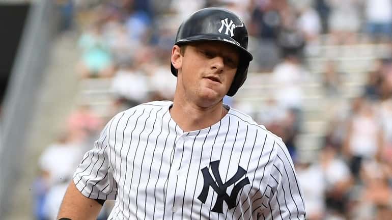 The Yankees' DJ LeMahieu rounds the bases on his leadoff...
