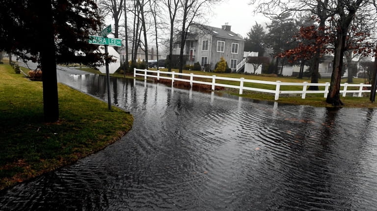 Flooding on Laura Lee Drive in Center Moriches on Saturday after...