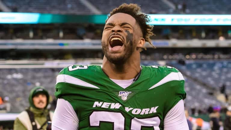Jets strong safety Jamal Adams celebrates the a victory over...