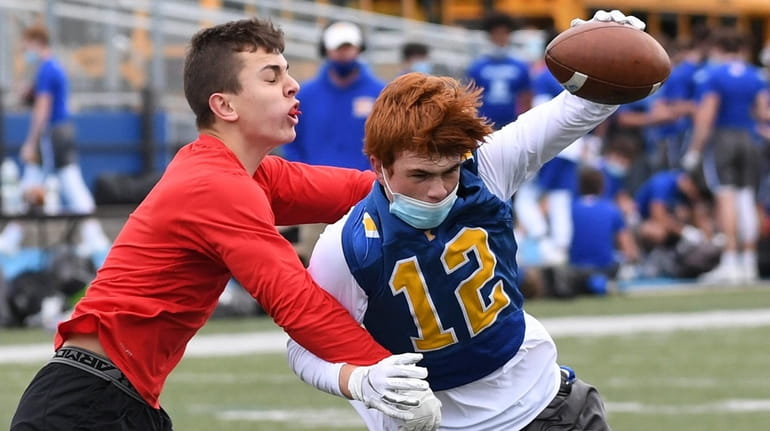 Kellenberg wide receiver Maximus Mongelli drives into the end zone...