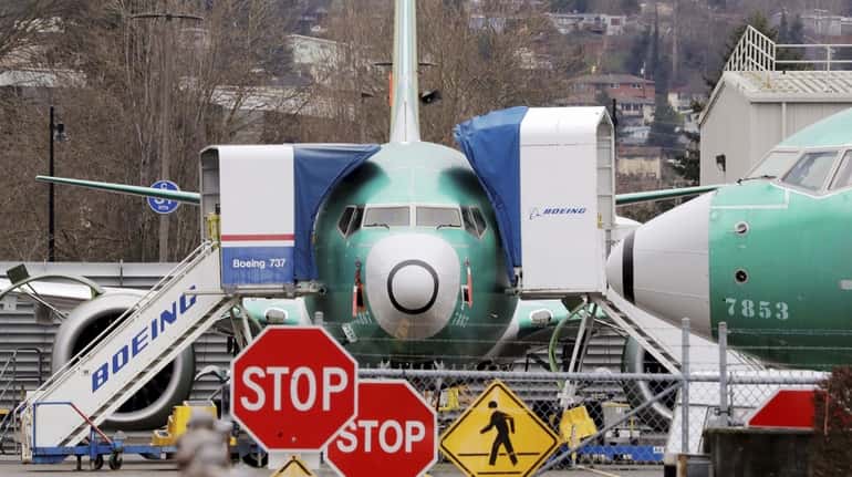 A Boeing 737 Max jet is parked in Renton, Washington,...