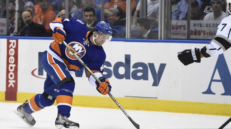 New York Islanders defenseman Calvin de Haan shoots against the...