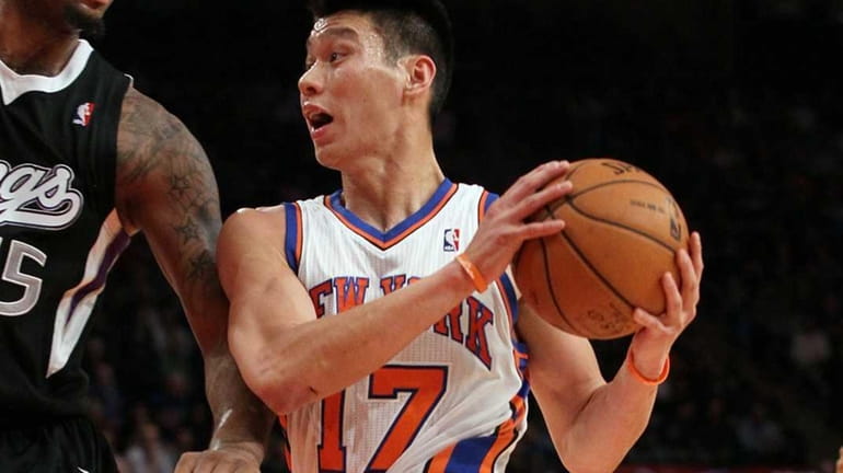 Jeremy Lin of the New York Knicks drives to the...