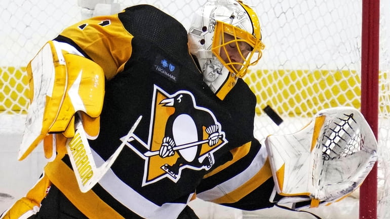 Pittsburgh Penguins goaltender Casey DeSmith blocks a shot during the...