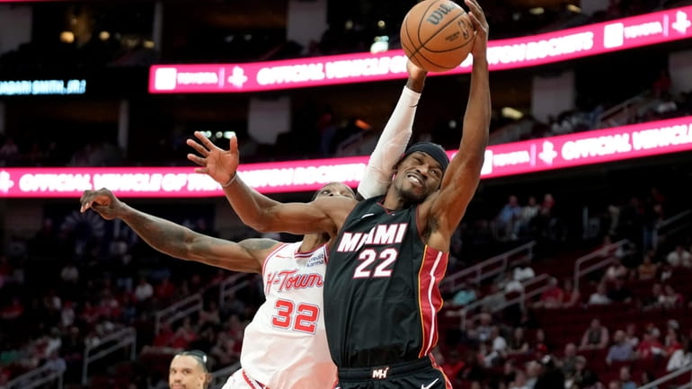 Miami Heat forward Jimmy Butler (22) and Houston Rockets forward...