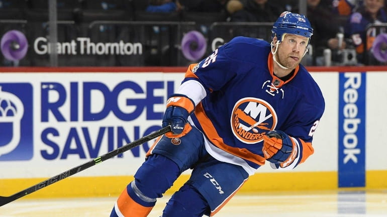 New York Islanders left wing Jason Chimera skates against the...