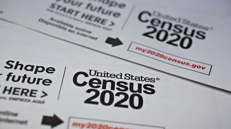 U.S. Census 2020 mailings are arranged for a photograph in...