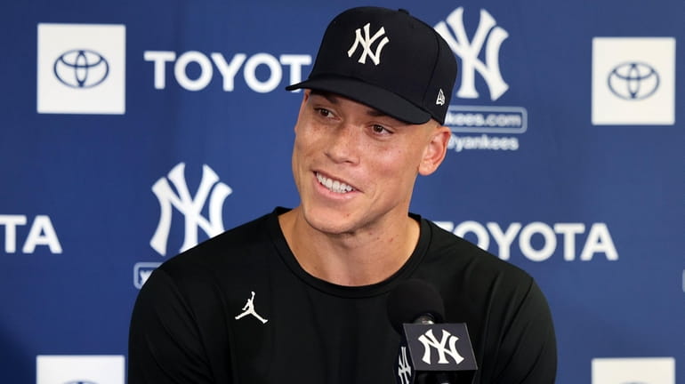 The Yankees' Aaron Judge speaks to the media during the...