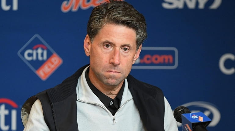 New York Mets COO Jeff Wilpon looks on during a...