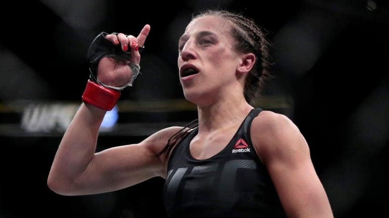 Joanna Jedrzejczyk reacts at the end of her women's strawweight...