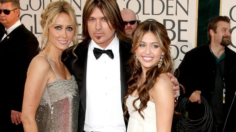 Leticia 'Tish' Cyrus, Billy Ray Cyrus and Miley Cyrus arrive...