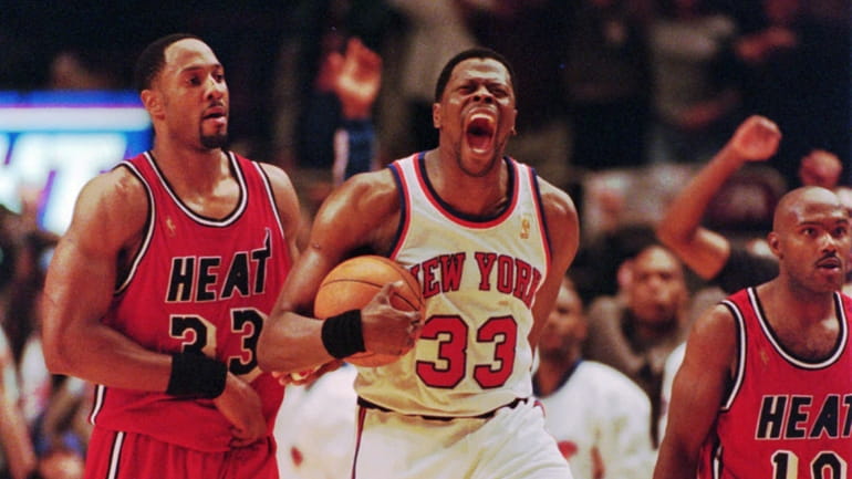Knicks center Patrick Ewing celebrates his game-winning blocked shot against...