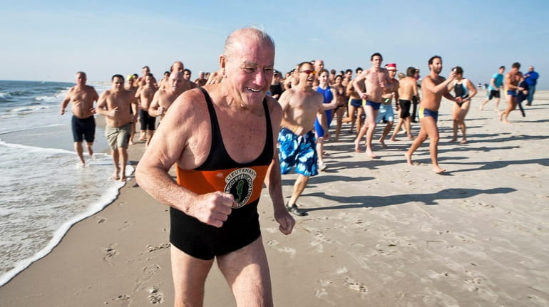 Reggie Jones Sr., at age 83, jogs before swimming in the...